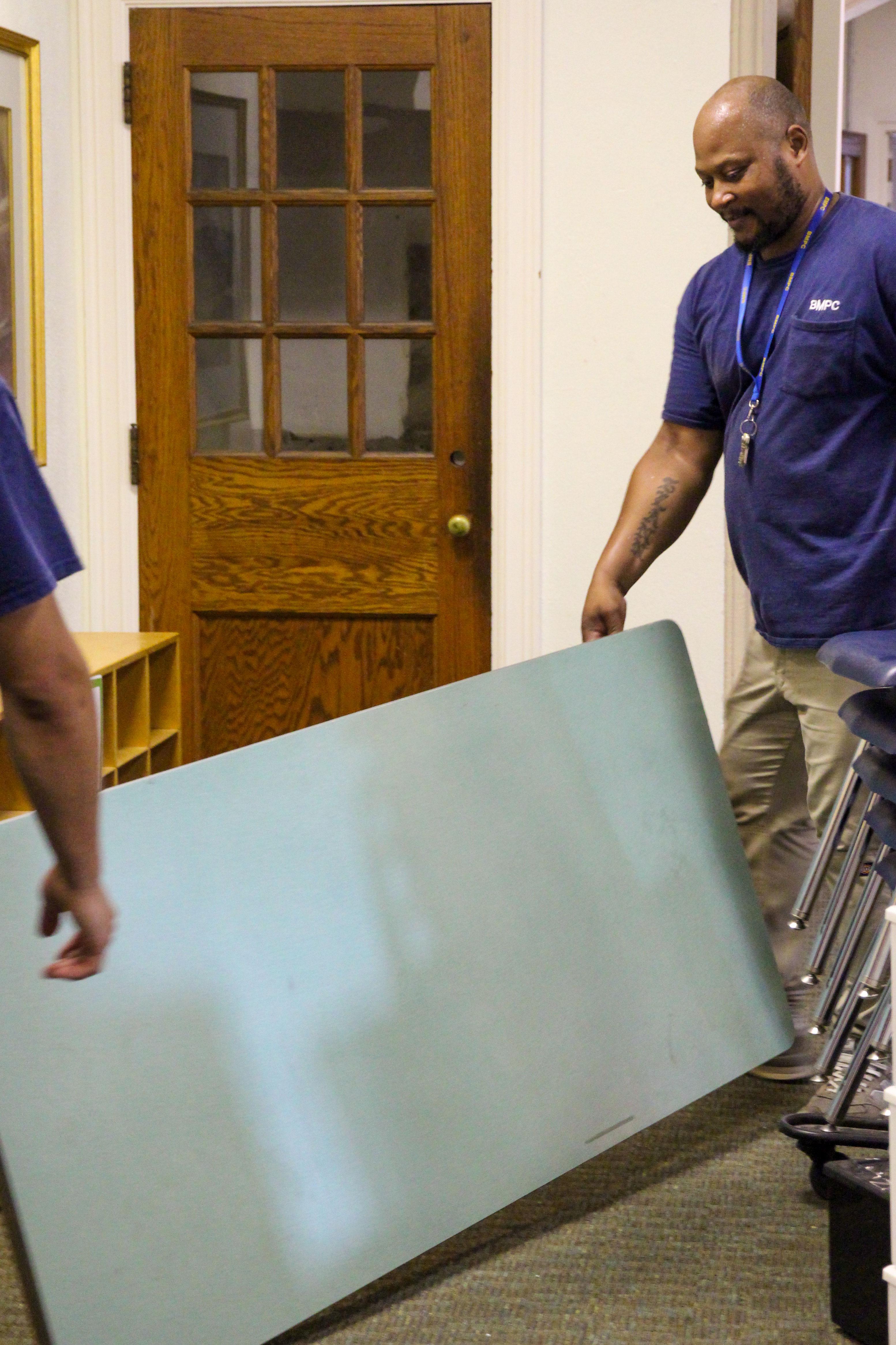 Facilities Staff Moving Tables